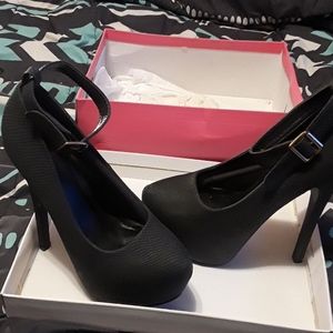 Black python look stilettos